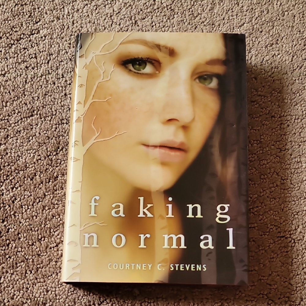 Faking Normal Hardcover Book